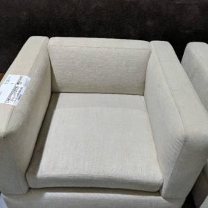 EX HIRE CREAM ARMCHAIR SOLD AS IS