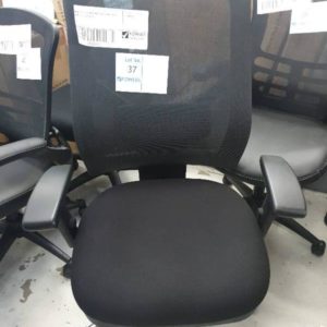 NEW OFFICE BLACK MATERIAL CHAIR WITH WHEELS SOLD AS IS