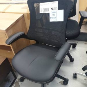 NEW OFFICE BLACK PU CHAIR WITH WHEELS SOLD AS IS