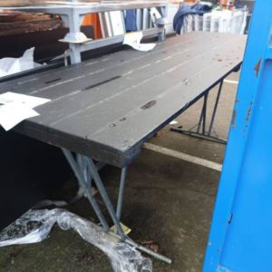EX HIRE - LARGE CATERERS BLACK TIMBER FOLDING TABLE SOLD AS IS