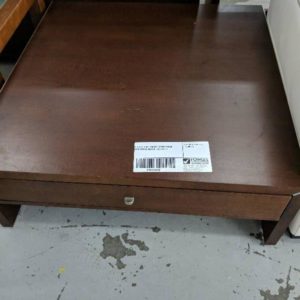 DISPLAY HOME TIMBER COFFEE TABLE WITH METAL EDGING SOLD AS IS