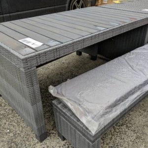 GREY RATTAN DINING TABLE & 2 BENCH SEATS SOLD AS IS