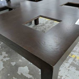 DISPLAY HOME SQUARE TIMBER DINING TABLE WITH SQUARE CUT OUTS MISSING GLASS SOLD AS IS