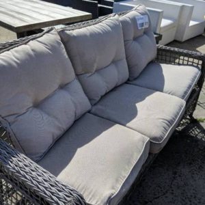 EX HIRE RATTAN 3 SEATER OUTDOOR COUCH WITH CUSHIONS SOME MARKS IN RATTAN SOLD AS IS