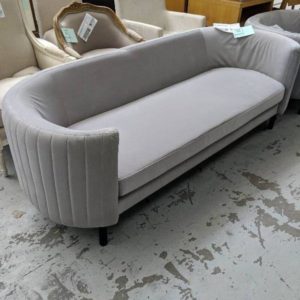 EX HIRE - GREY VELVET CURVED COUCH -SMALL TEAR IN EACH END SOLD AS IS
