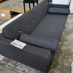 EX HIRE - GREY FELT MODERN 2.5 SEATER COUCH SMALL TEAR IN BACK CORNER SOLD AS IS
