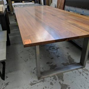 EX-DISPLAY BALFOUR 2700MM X 1100MM TIMBER DINING TABLE WITH STAINLESS LEGS SLIGHT DAMAGE IN CORNER EDGE RRP$3600