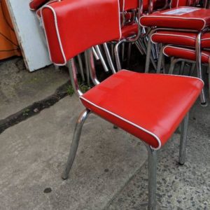 EX HIRE RETRO RED PU KIDS CHAIR WITH WHITE PIPING CHROME LEGS SOLD AS IS