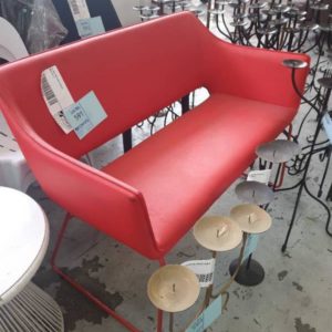 EX HIRE RED VINYL COUCH SOLD AS IS