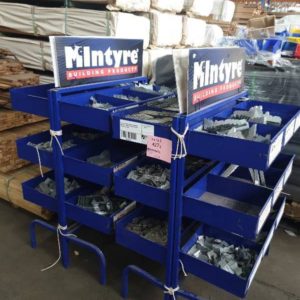 4 ASST'D DISPLAY STANDS CONTAINING VARIOUS MC INTYRE BUILDING PRODUCTS- (STANDS INCLUDED)