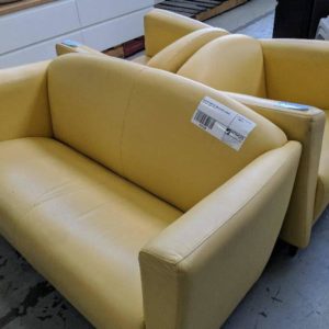 SECOND HAND YELLOW LEATHER LOUNGE SETTING SOLD AS IS