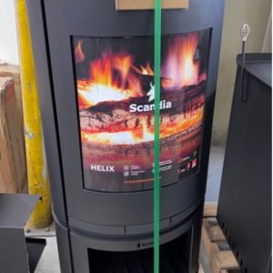 SCANDIA HELIX WOOD FIRE HEATER WITH WOOD STACKER SOLD AS IS SOME DENTS AND SCRATCHES RRP$1799