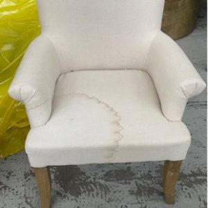 EX HIRE FURNITURE - CREAM UPHOLSTERED CHAIR STAINED SOLD AS IS