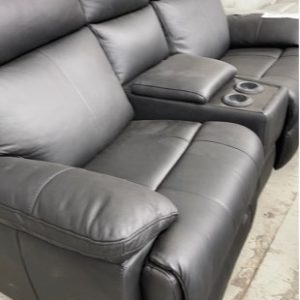 EX DISPLAY THICK BLACK LEATHER THEATRE COUCH WITH DRINK HOLDERS ELECTRIC RECLINERS SOLD AS IS