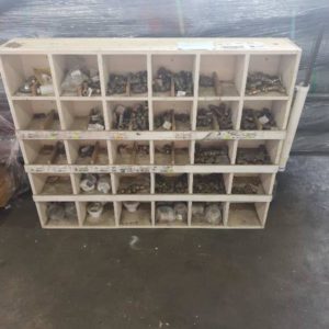 TIMBER DISPLAY UNIT CONTAINING TAPS FITTINGS PLUGS AND ELBOWS-(MOSTLY BRASS)