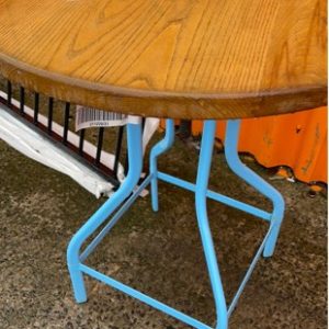 EX HIRE BAR TABLE WITH TIMBER TOP AND BLUE METAL BASE SOLD AS IS
