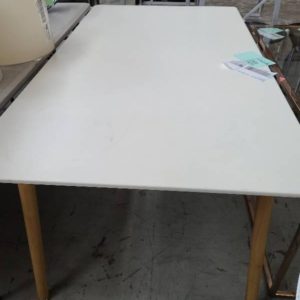 EX HIRE FURNITURE - WHITE DINING TABLE SOLD AS IS