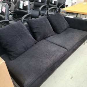 EX HIRE - BLACK 2 SEATER COUCH SOLD AS IS