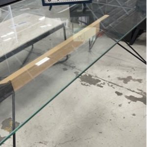 EX HIRE FURNITURE - GLASS DINING TABLE SOLD AS IS