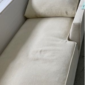 EX HIRE FURNITURE - CREAM LINEN CHAISE COUCH SOLD AS IS