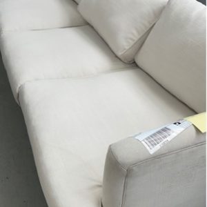 EX HIRE - CREAM 3 SEATER COUCH SOLD AS IS