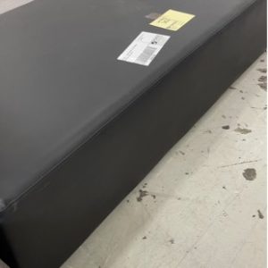 EX HIRE - LARGE BLACK PU RECTANGLE OTTOMAN SOLD AS IS