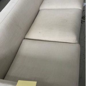EX HIRE - CREAM 3 SEATER COUCH SOLD AS IS
