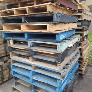 STACK OF TIMBER PALLETS