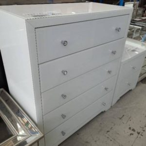 EX SHOWROOM STOCK - NEW WHITE GLASS 5 DRAWER TALLBOY SOLD AS IS