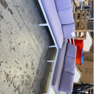 EX HIRE WHITE METAL CORNER OUTDOOR LOUNGE WITH LAVENDER CUSHIONS SOLD AS IS