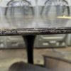 EX HIRE OVAL BLACK FAUX STONE DINING TABLE EXTREMELY HEAVY AT LEAST 100KG CHIPPED DAMAGED CHECK PICTURES SOLD AS IS 2000MM LONG X 1210MM ACROSS