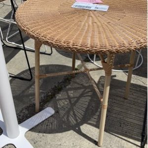 EX HIRE - ROUND RATTAN TABLE SOLD AS IS