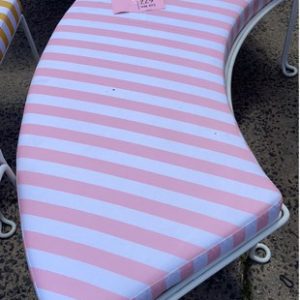EX HIRE - CURVED PINK & WHITE STRIPED BENCH SEAT SOLD AS IS
