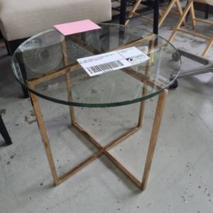 EX-HIRE ROUND GLASS SIDE TABLE WITH BRONZE LEGS SOLD AS IS