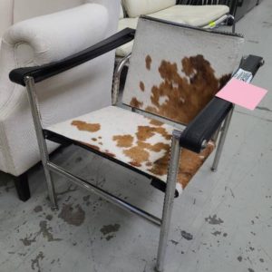 EX-HIRE COW SKIN LOW CHAIR SOLD AS IS