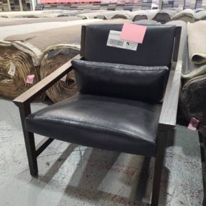 EX-HIRE BLACK LEATHER LOW CHAIR WITH BLACK CUSHION SOLD AS IS