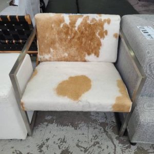 EX-HIRE COW SKIN CHAIR WITH METAL FRAME SOLD AS IS