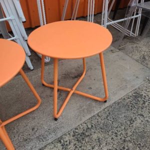 EX-HIRE ORANGE ROUND METAL SIDE TABLE SOLD AS IS