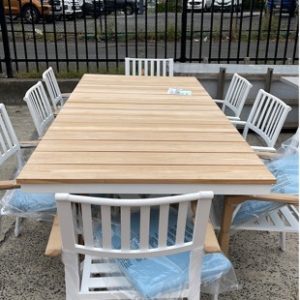 EX DISPLAY NATURAL TIMBER TOP OUTDOOR 9 PIECE SETTING WITH 8 CHAIRS WHITE CROSS LEG FRAME WITH 6 POWDER WHITE CHAIRS WITH BABY BLUE CUSHIONS SOLD AS IS