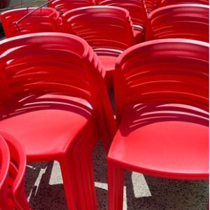 BRAND NEW RED ACRYLIC CAFE/OUTDOOR DINING CHAIR STACKABLE