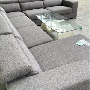 EX DISPLAY HOME FURNITURE - GREY MATERIAL 6 SEATER CORNER COUCH SOLD AS IS