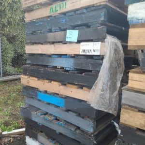 STACK OF USED TIMBER PALLETS SOLD AS IS