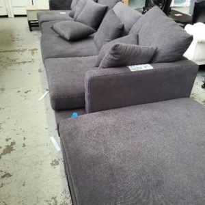 EX DISPLAY MANHATTAN OVER SIZE LARGE MODULAR COUCH WITH OTTOMAN LICORICE FABRIC SOLD AS IS SOLD AS IS