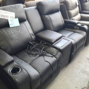 EX DISPLAY PARAMOUNT THICK BLACK LEATHER 2 SEATER COUCH WITH ELECTRIC RECLINERS AND HEADRESTS SOLD AS IS