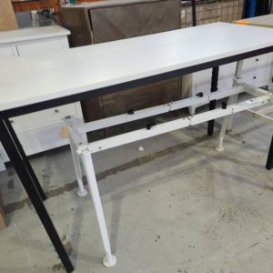 EX-HIRE TALL WHITE TABLE WITH BLACK LEGS SOLD AS IS