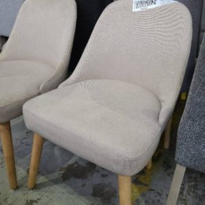 SAMPLE BEIGE DINING CHAIR SOLD AS IS
