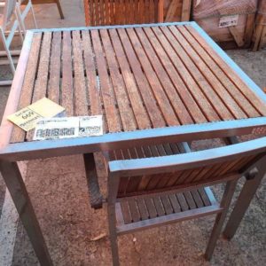 EX HIRE TIMBER TABLE & 2 CHAIR SOLD AS IS
