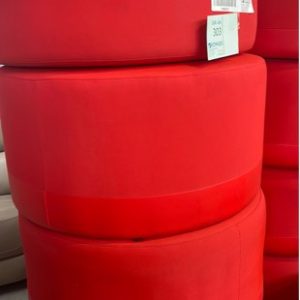 EX-HIRE ROUND RED OTTOMAN SOLD AS IS