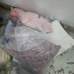 EX HIRE - BAG OF ASSORTED CUSHIONS RUGS ETC SOLD AS IS