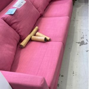 EX HIRE PINK MATERIAL COUCH SUPPLIED WITH LEGS BUT NO SCREWS LEGS SEPARATE SOLD AS IS